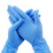Spolverizzi i guanti eliminabili del nitrile dell'esame medico libero